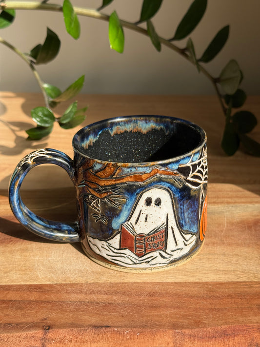 Carved Reading Ghost Mug A