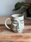 Sculpted Face Mug B