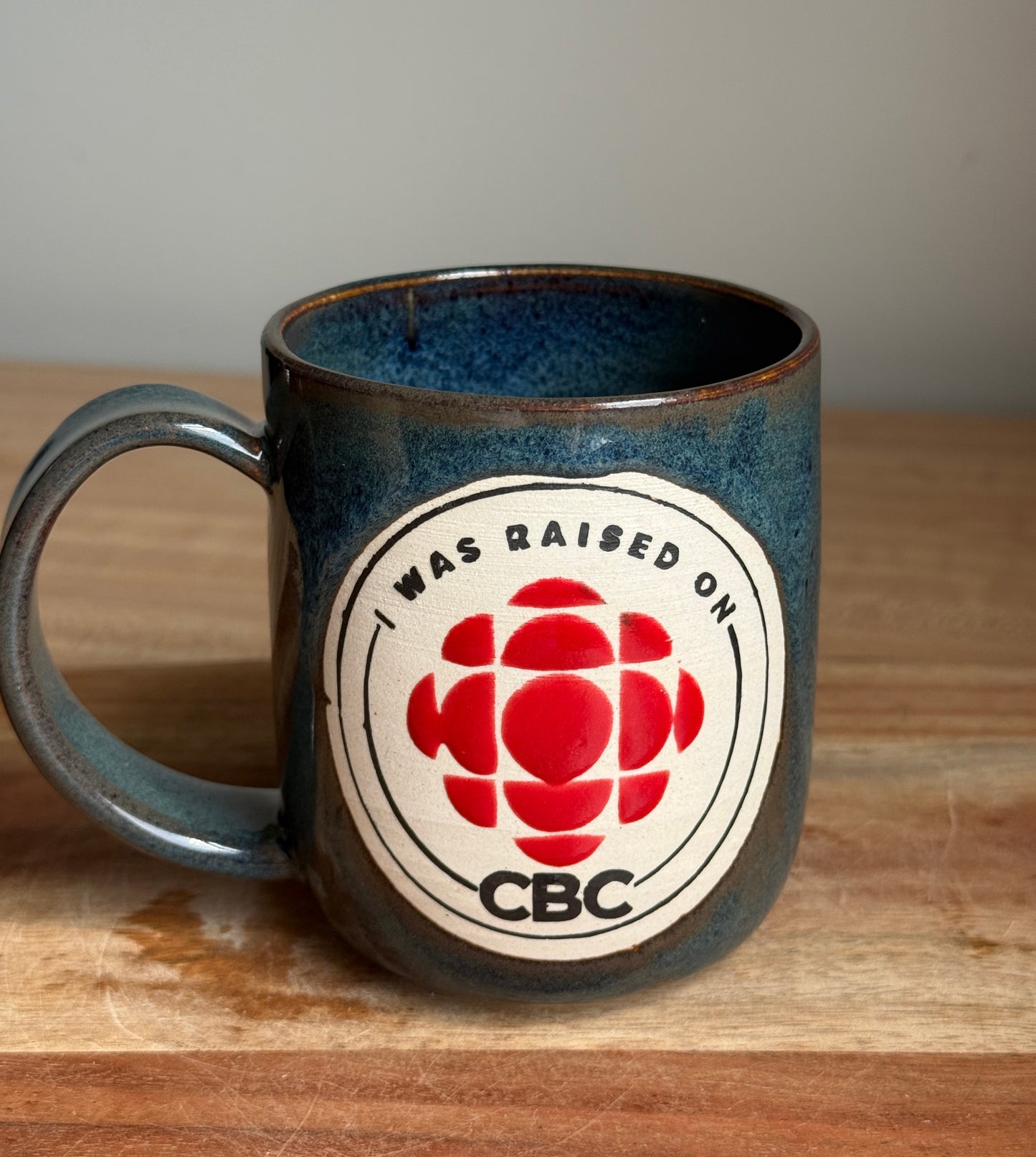 Blue "I Was Raised On CBC" Mug
