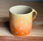 Funky Handled Orange Ombre Mug with Retro Pattern