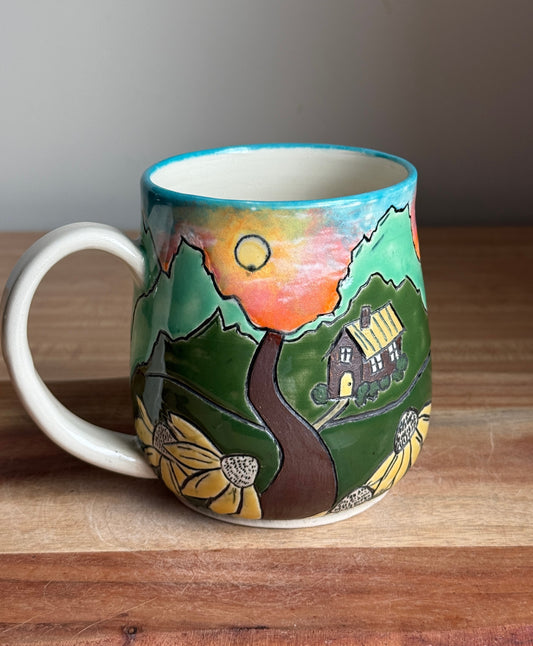 Mountain and Cabin Scene Mug