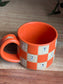 Matte Orange Checkered Ghost Mug