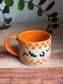 Orange Checkered Mug w. Bats