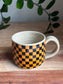 Orange and Black Checkered Ghost Mug