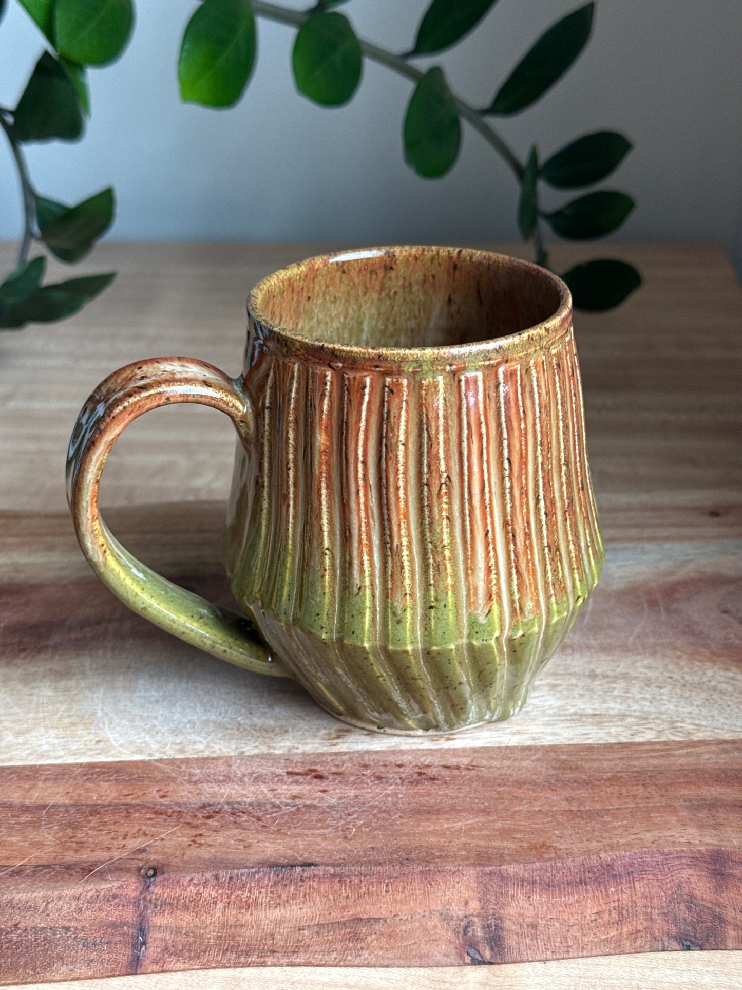 Green and Brown Carved Mug