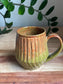 Green and Brown Carved Mug