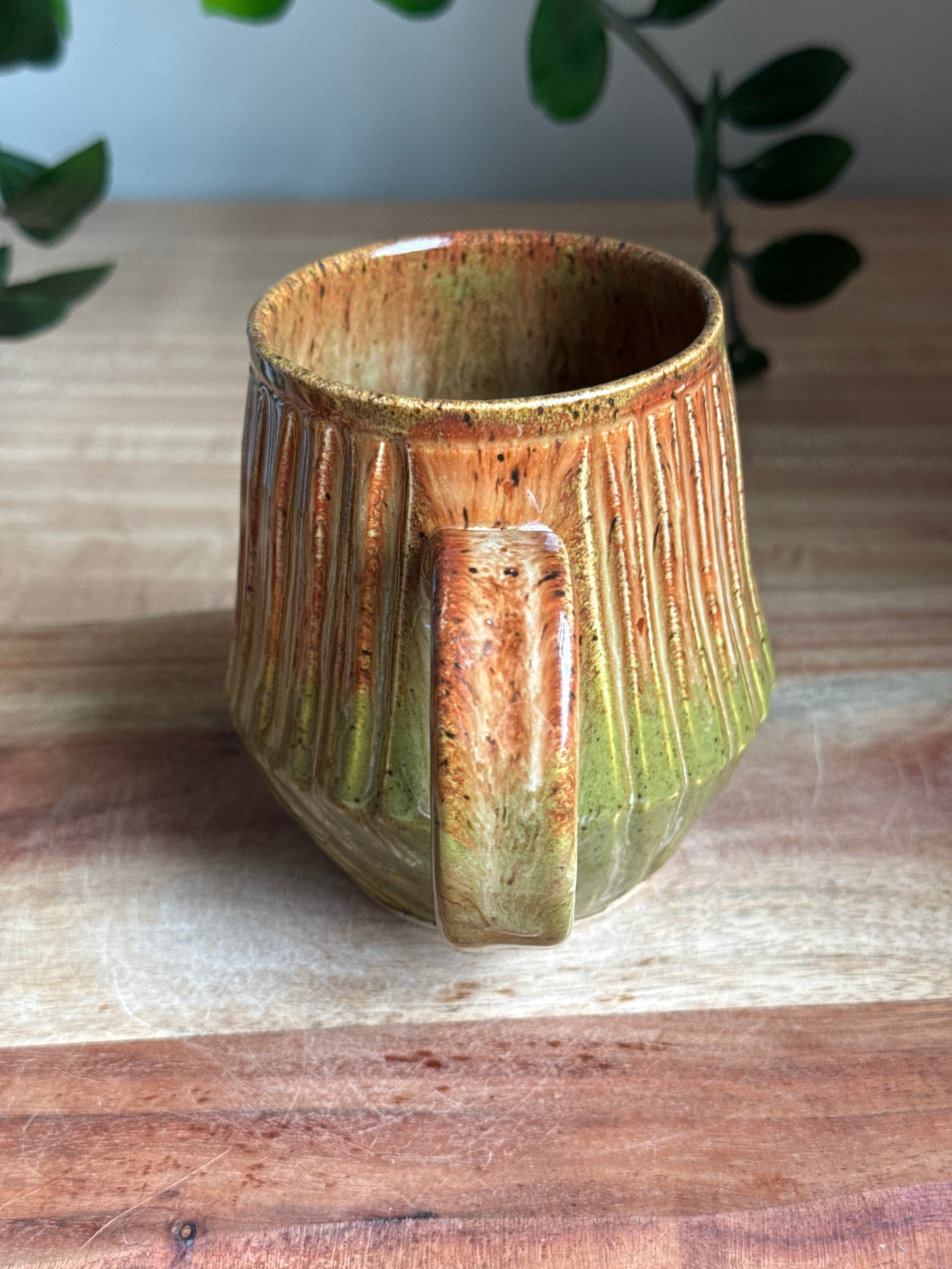 Green and Brown Carved Mug