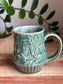 Blue Carved Moon and Leaves Mug A