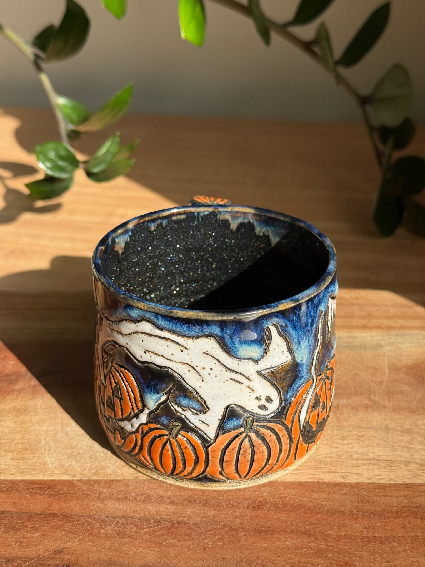 Carved Ghost and Pumpkin Scene Mug A