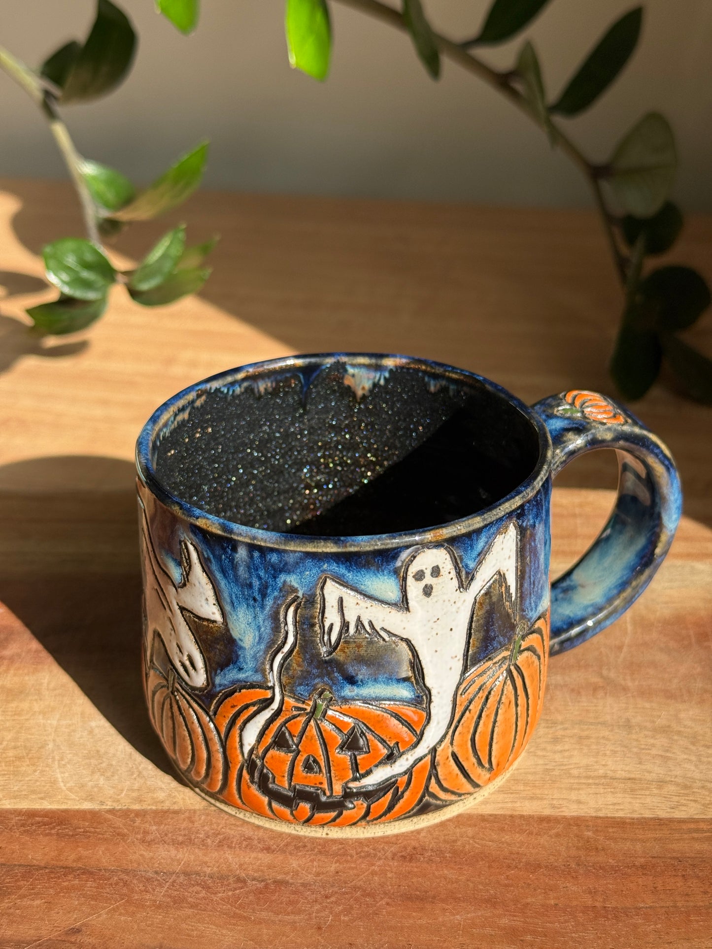 Carved Ghost and Pumpkin Scene Mug A