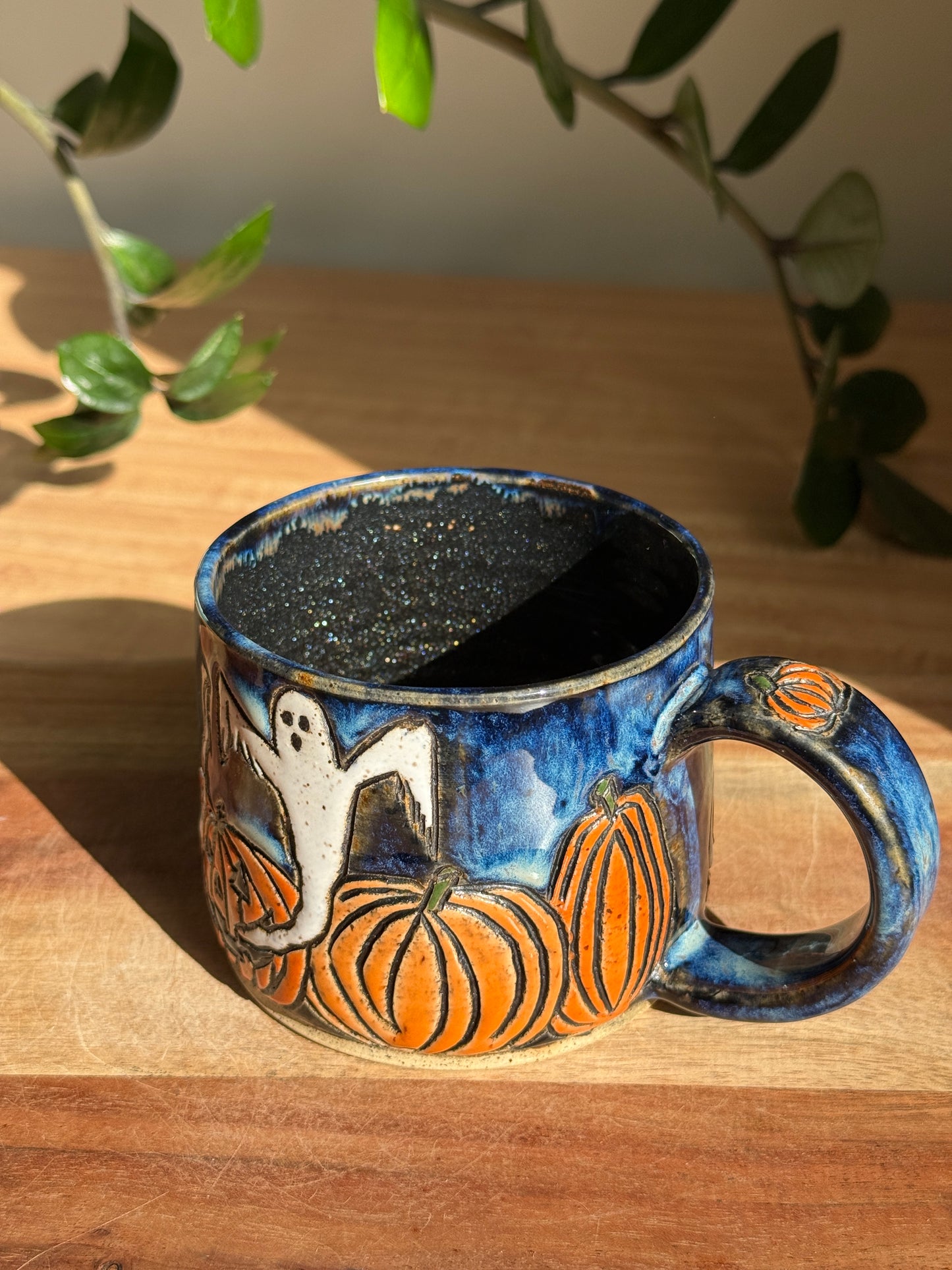 Carved Ghost and Pumpkin Scene Mug A