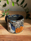 Carved Reading Ghost Mug A