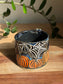 Carved Reading Ghost Mug A