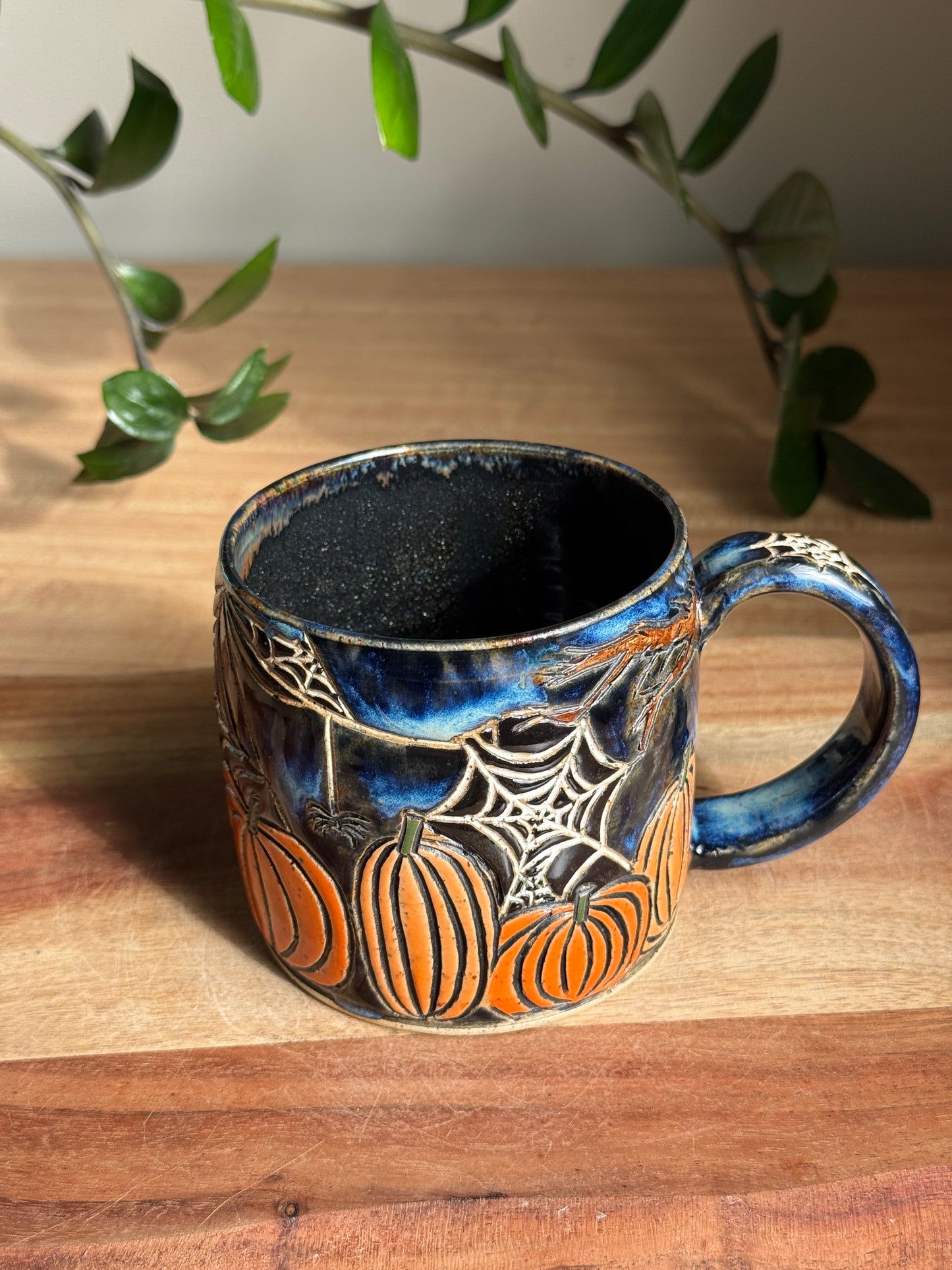 Carved Reading Ghost Mug B