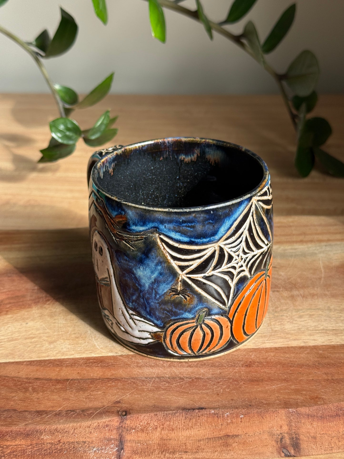 Carved Reading Ghost Mug B