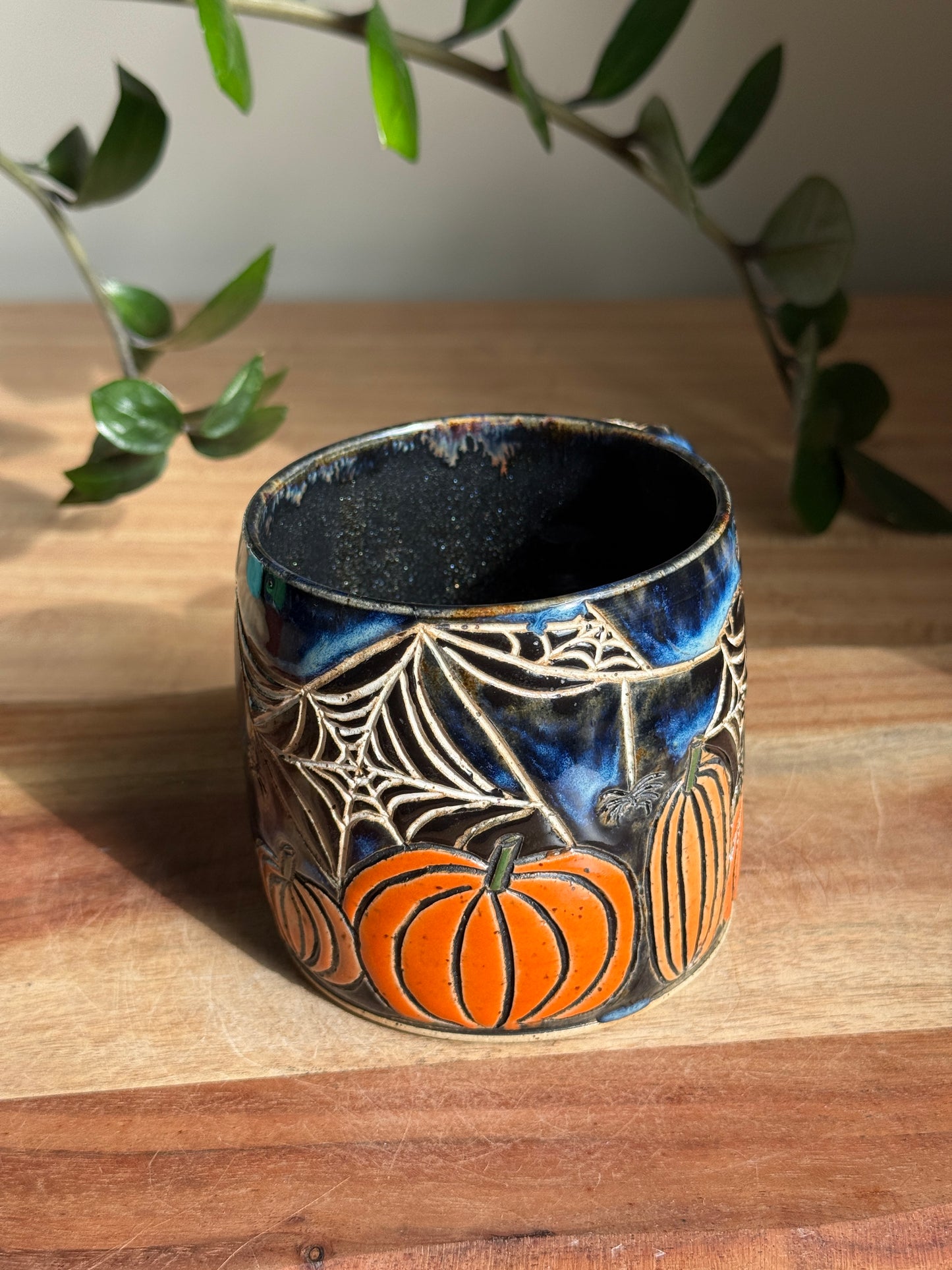 Carved Reading Ghost Mug B