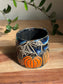 Carved Reading Ghost Mug B