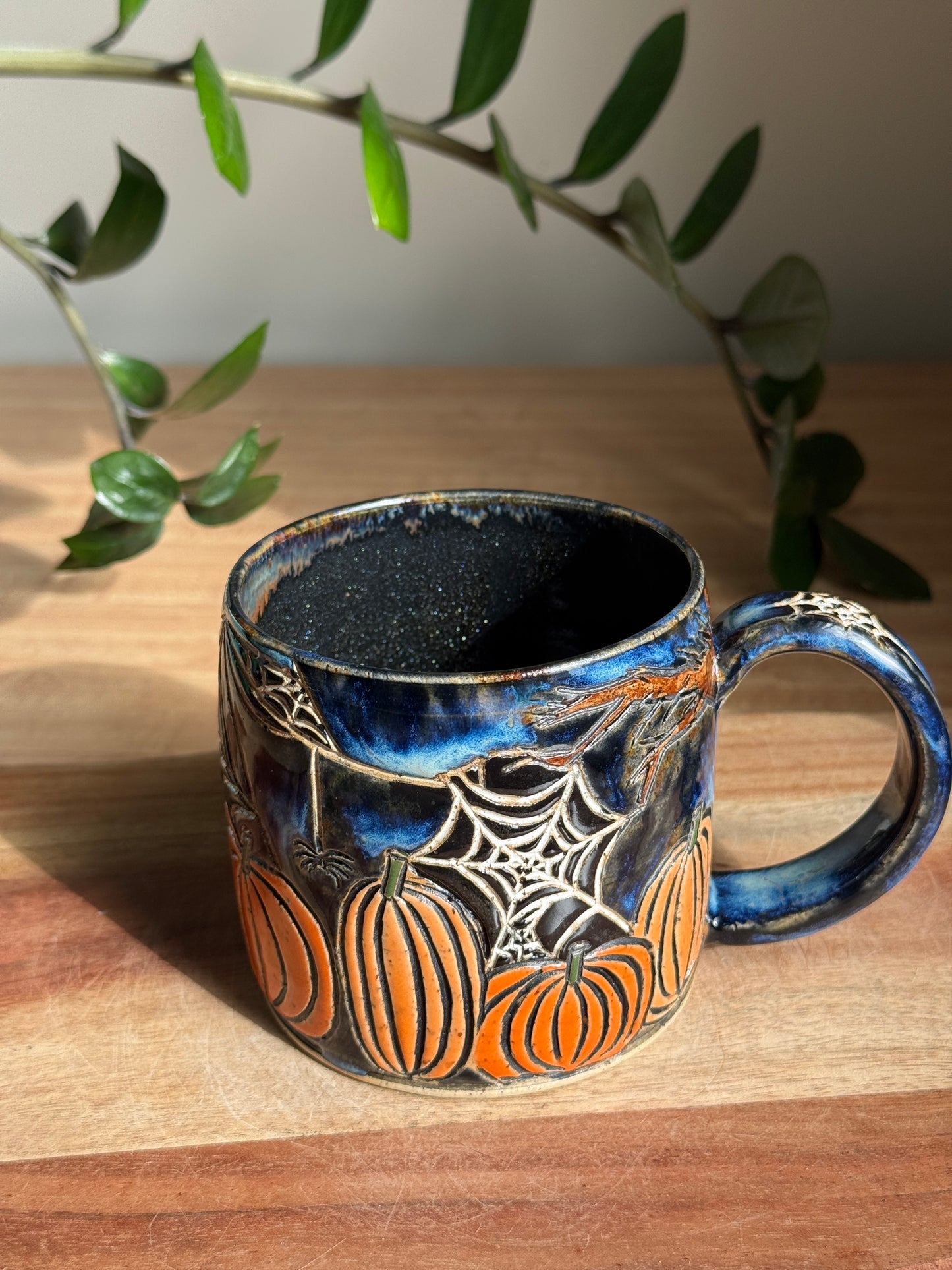 Carved Reading Ghost Mug B