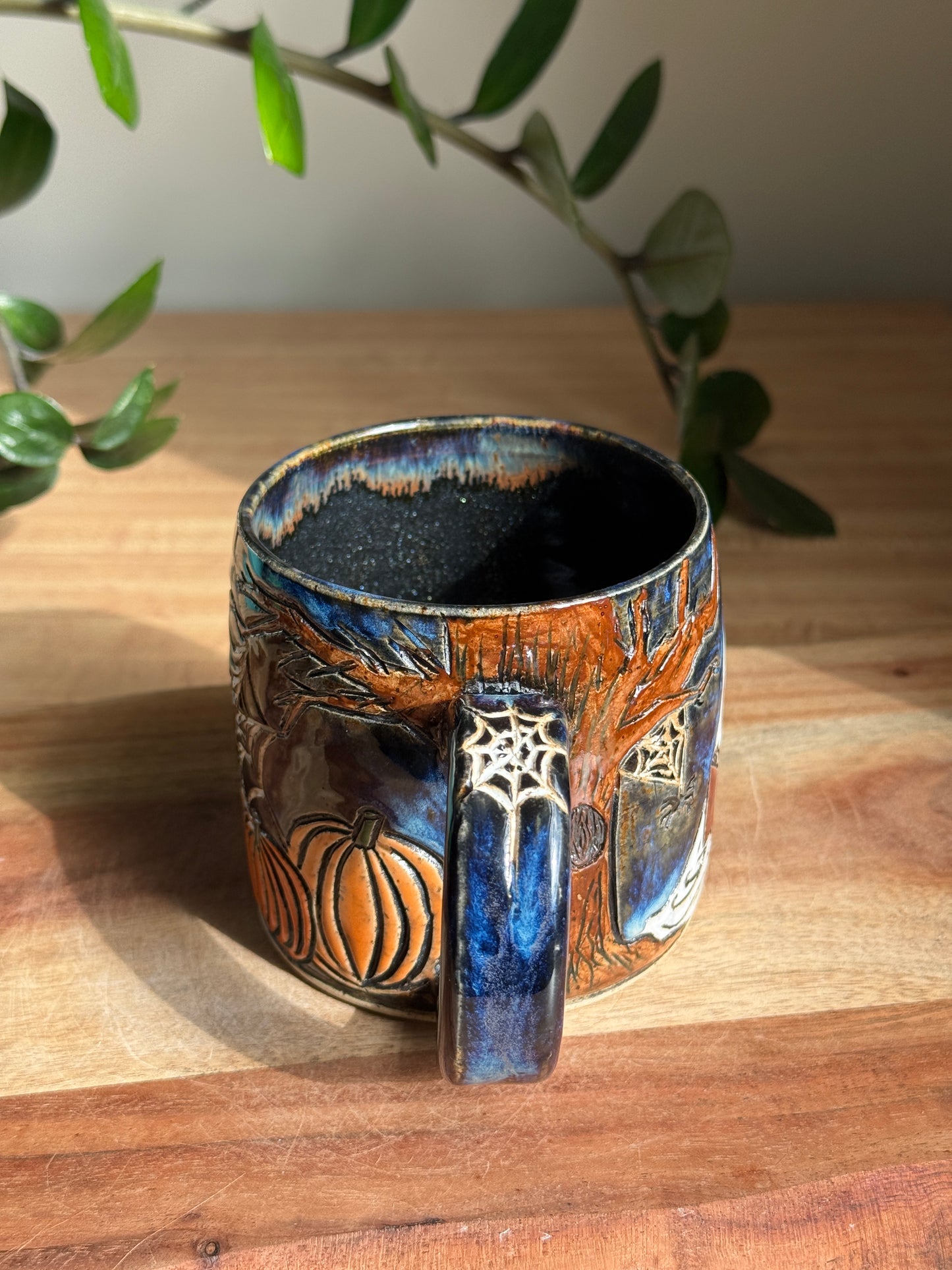 Carved Reading Ghost Mug B