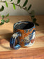 Carved Reading Ghost Mug B