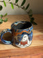 Carved Reading Ghost Mug B