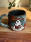 Carved Reading Ghost Mug C