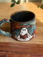 Carved Reading Ghost Mug C