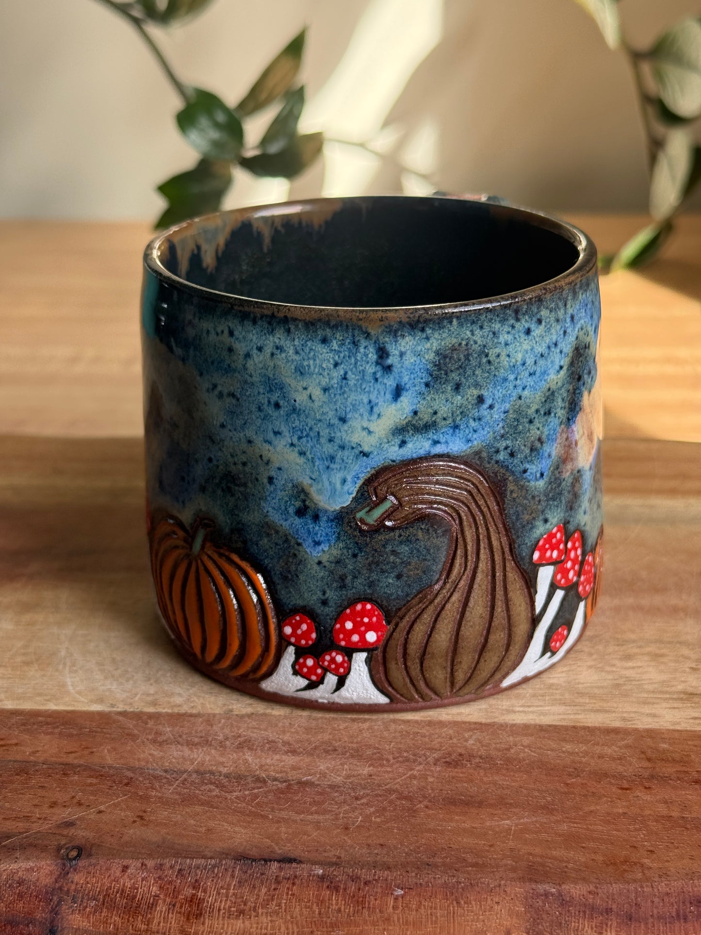 Carved Reading Ghost Mug C