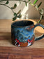 Carved Reading Ghost Mug C