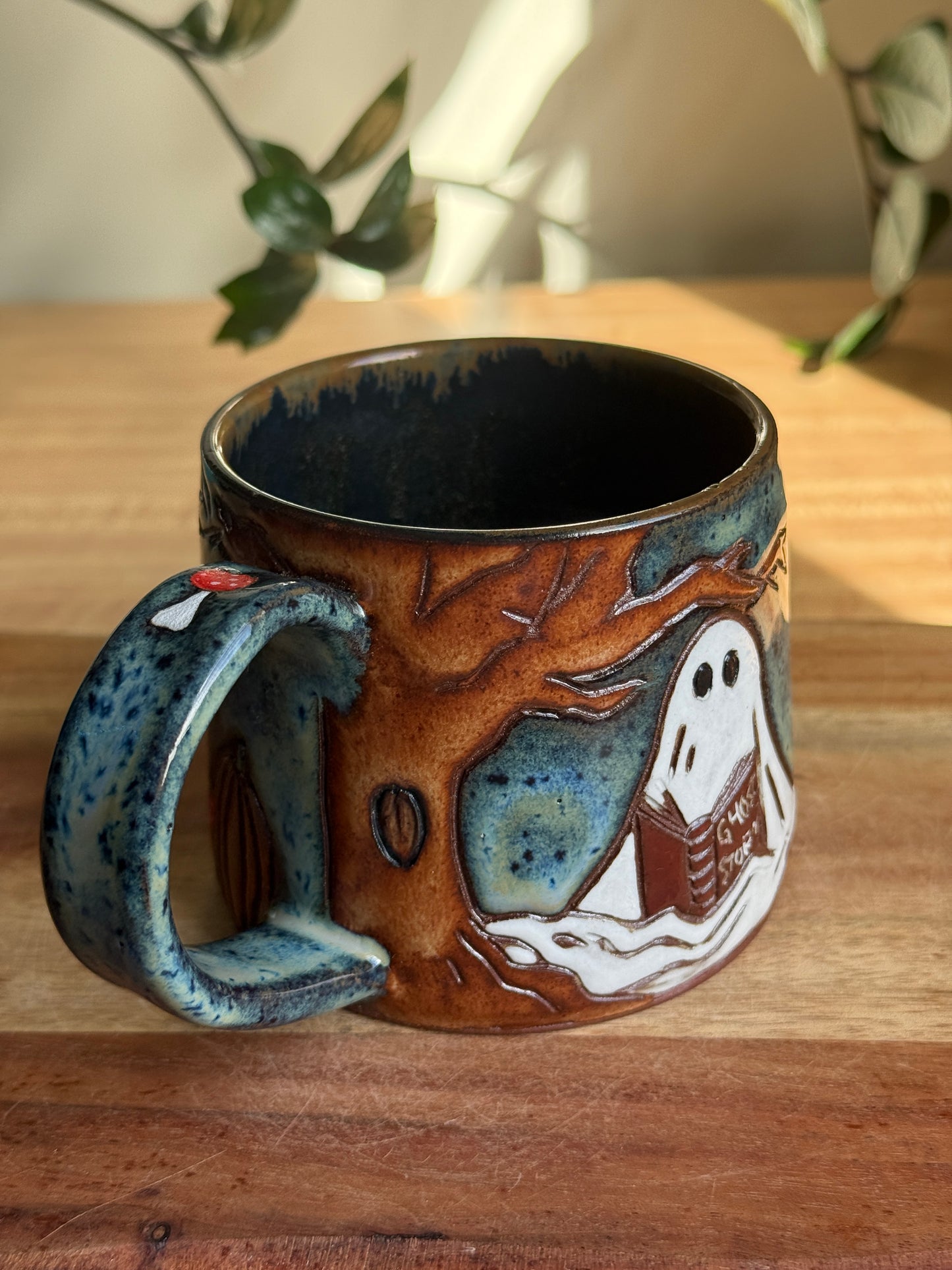 Carved Reading Ghost Mug C