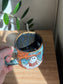 Carved Reading Ghost Mug C