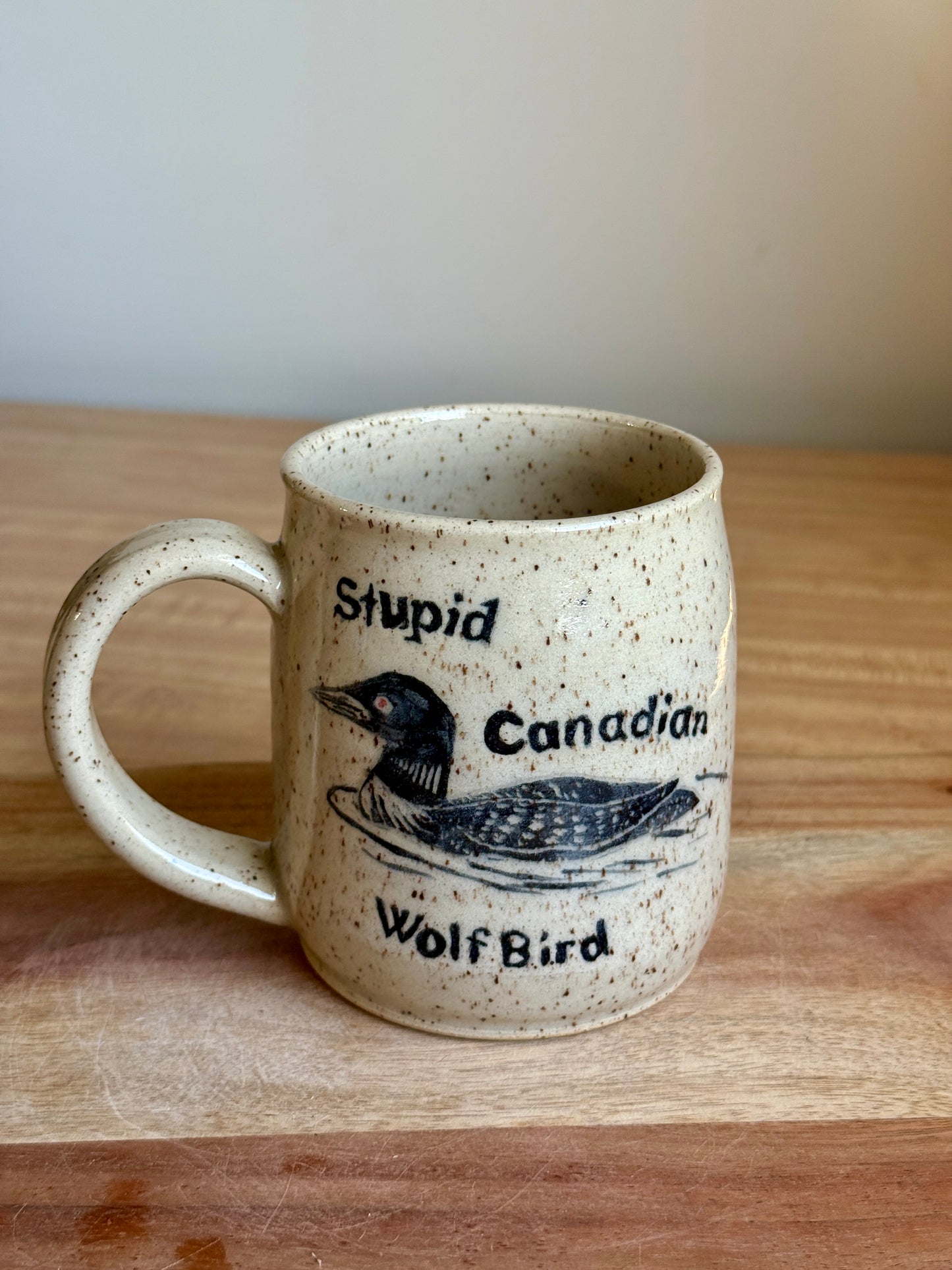 Stupid Canadian Wolf Bird Mug 1