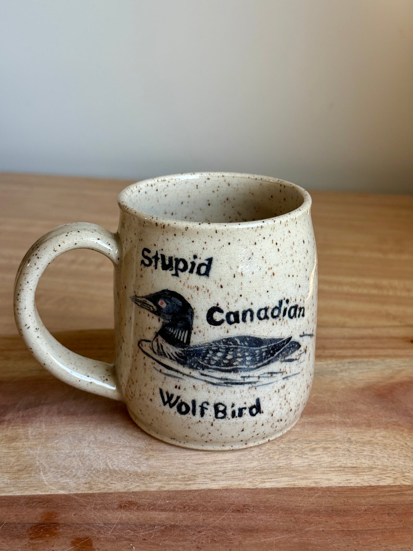 Stupid Canadian Wolf Bird Mug 1