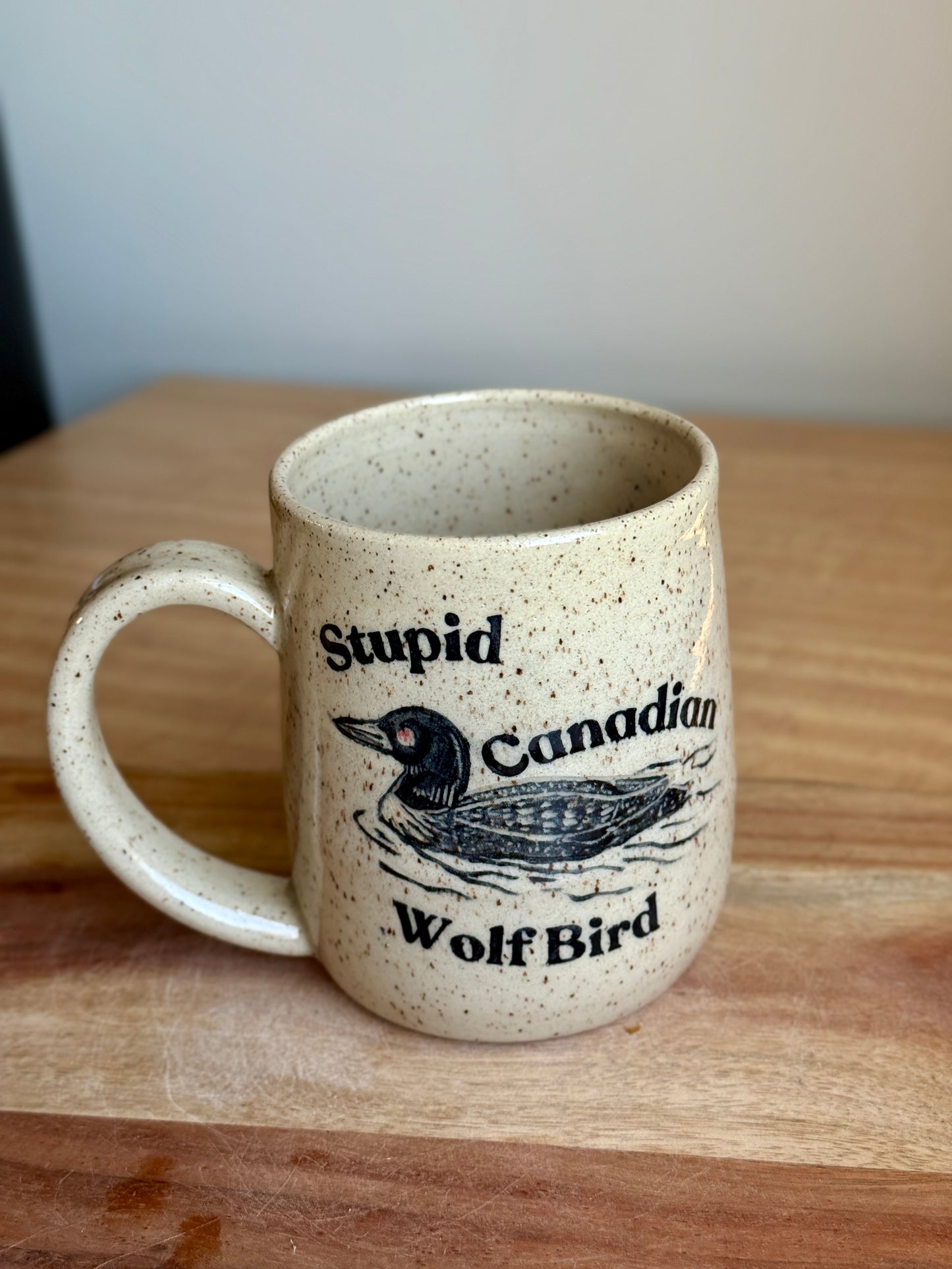 Stupid Canadian Wolf Bird Mug 1